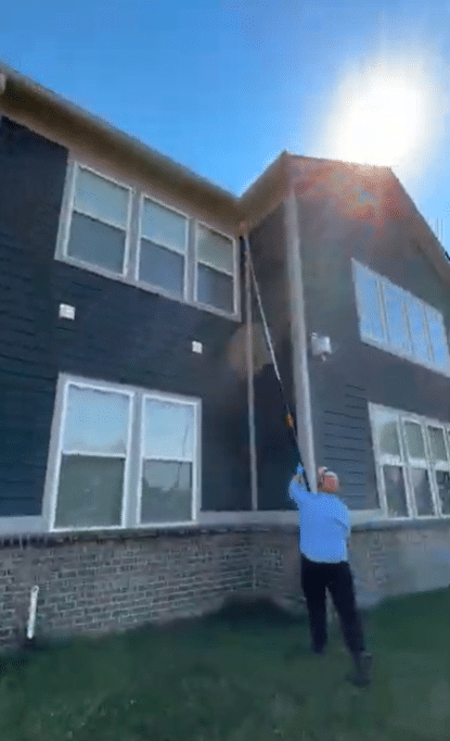 Blue Duck Pest Control Technician Performing General Pest Control in Indiana Home