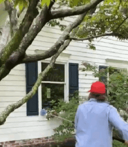 Blue Duck Pest Control Technician Performing Quarterly Pest Treatment at Indiana Home